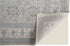7' X 10' Silver Taupe and Blue Oriental Power Loom Worn Faded Area Rug With Fringe